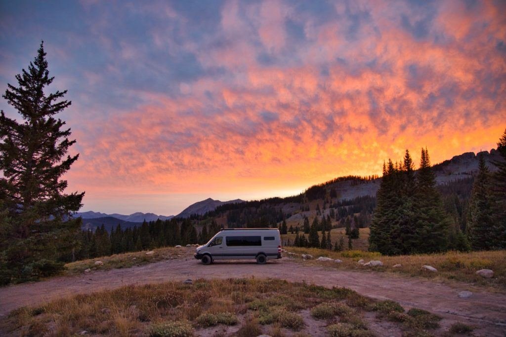 Sprinter Van parked at sunset at a dispersed campsite near Crested Butte